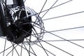 Parts of a bicycle wheel close up and spokes, disc brakes on a white background Royalty Free Stock Photo