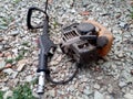 Parts from broken motos. a Petrol trimmer disassembled