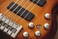 Parts of Electric guitar. Close up view of electric guitar body with volume and tone control knobs Royalty Free Stock Photo