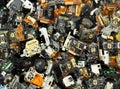 Parts of old optical drives as industrial waste background