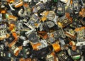 Parts of old optical drives as industrial waste background