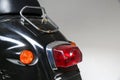 the rear part of the vintage scooter. rear light of old moped. Royalty Free Stock Photo