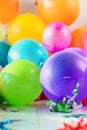 Party background balloons Many colorful balloons wooden table