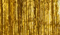 Party Background. Decor made of gold foil, tinsel and candy. Festive and cheerful mood