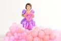 Party balloons. Valentines day. Happy birthday. Kid fashion. Little miss in beautiful dress. Childhood and happiness