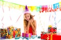 Party blond kid girl happy with puppy present Royalty Free Stock Photo