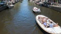 Party boats in Amsterdam canal