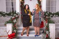 Party and celebration. Winter holiday. Christmas plus size woman New year girls staying on porch. plus size woman Royalty Free Stock Photo