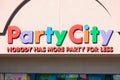 Party City retail chain store exterior. Nobody has more party for less slogan of facade.