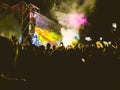 Crowd raising their hands and enjoying great festival party or concert.