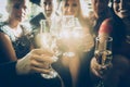 Party crowd clinking glasses with champagne Royalty Free Stock Photo