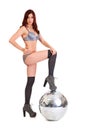 Party dancer on high heels with disco ball Royalty Free Stock Photo