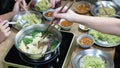 Party eating sukiyaki in home Royalty Free Stock Photo