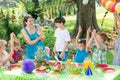 Party entertainer playing with kids