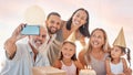 Party, family and birthday phone selfie with grandparents, parents and young children celebrating. Interracial, happy