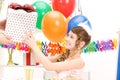 Party girl with balloons and gift box Royalty Free Stock Photo