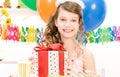 Party girl with balloons and gift box Royalty Free Stock Photo