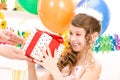 Party girl with balloons and gift box Royalty Free Stock Photo