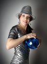Party girl with blue disco ball Royalty Free Stock Photo
