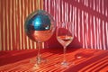 Party glass with wine and disco ball. Generative AI