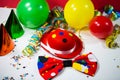Party hat with bow, balloons and streamers Royalty Free Stock Photo