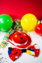 Party hat with bow, balloons and streamers Royalty Free Stock Photo