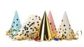 Party hats, blowers and confetti streamers on white background Royalty Free Stock Photo