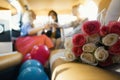 Party in limousine - happy girls celebrating, women drinks champagne - in front of bouquet of roses Royalty Free Stock Photo