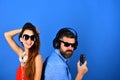 Party, music and fun concept. Man with beard and girl