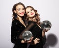Party and people concept: Party girls with disco balls Royalty Free Stock Photo