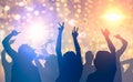 Party. People dancing in night club. many party people dancing bright lights, confetti flying everywhere nightclub event hands. Royalty Free Stock Photo