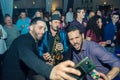 Tel-Aviv, Israel - 04.09.2019. Party people taking selfie with musician. Dance floor, fun, wedding Royalty Free Stock Photo