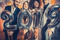 Party people women and men celebrating new years eve 2019 Royalty Free Stock Photo