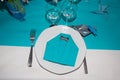 Party plates cutlery glasses wedding table white and blue