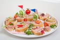 Party platter with slices of bread with home made pate, decorated with vegetables Royalty Free Stock Photo