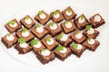 Party platter with small chocolate cakes