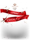 Grand opening banner with red cut levitating ribbons.