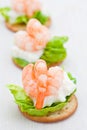 Party snacks. Prawns on a bed of lettuce & cheese