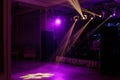 Party stage in dark with lights and silhouettes Royalty Free Stock Photo