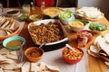 a party with tacos, burritos, and nachos as the star ingredients