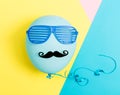 Party theme with balloon, moustache and shutter shades