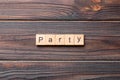 PARTY word written on wood block. PARTY text on cement table for your desing, concept Royalty Free Stock Photo