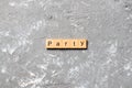 PARTY word written on wood block. PARTY text on cement table for your desing, concept Royalty Free Stock Photo