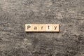 PARTY word written on wood block. PARTY text on cement table for your desing, concept Royalty Free Stock Photo