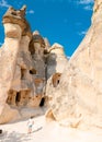 happy young men on vacation in Turkey Cappadocia, Rock Formations in Pasabag Monks Valley, Cappadocia, Turkey Royalty Free Stock Photo