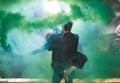 Pasadoble, latin solo dance and contemporary dance - Handsome man and woman dancing into smoke cloud. Royalty Free Stock Photo