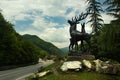 Pasanauri, Georgia - June 19, 2016: Roadside sculpture of deers near the confluence of Black and White Aragvi rivers