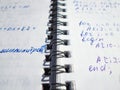 Pascal program written in a notebook. side view. the work of the programmer and sisadmida Royalty Free Stock Photo