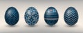 Paschal eggs decorated with blue knitting patterns