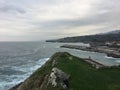 Paseo de San Pedro view from a cliff on a rainy day in March, Llanes, Principality of Asturias, in the north of Spain